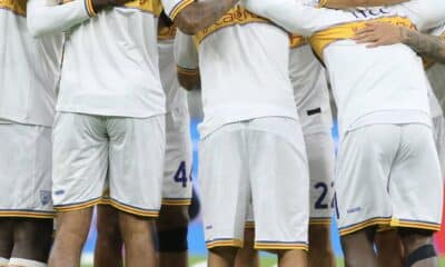 Il Lecce nel riscaldamento di Milan-Lecce di Coppa Italia (© US Lecce)