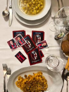 Eating tortellini and tagliatelle al ragù whereas exchanging Bologna FC stickers (© Ilaria Matteuzzi & Alessia Lelli- 1000cuorirossoblù)