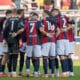 Il cerchio dei giocatori del Bologna (© Damiano Fiorentini)