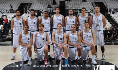 Virtus Pallacanestro Sessantaseiesima puntata. La Virtus 2011/12 dopo i cambiamenti nel roster. In piedi: Luca Vitali, Werner, Douglas-Roberts, Gigli, Sanikidze, Quaglia, Lang. Sotto: Person, Poeta, Koponen, Canelo, Gailius.